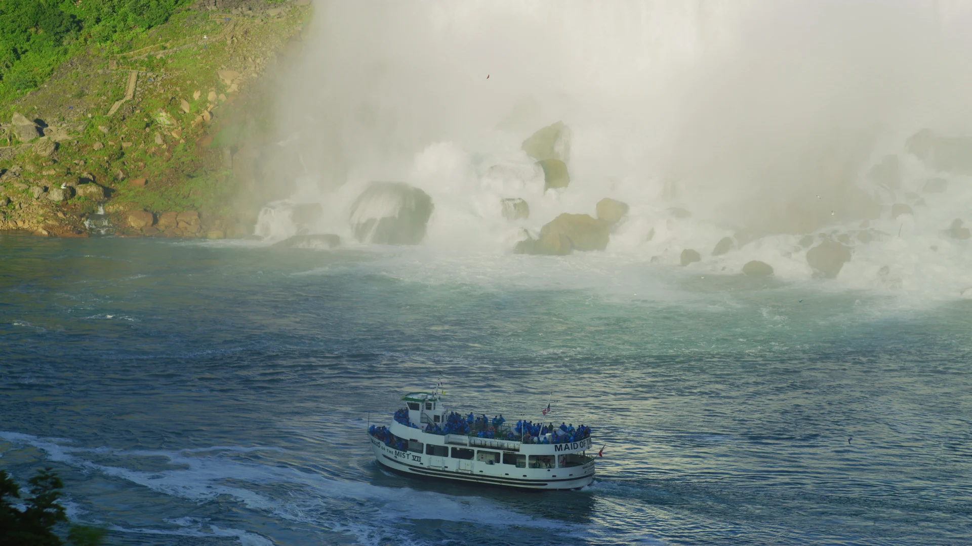Maid of the Mist sightseeing boat below the falls